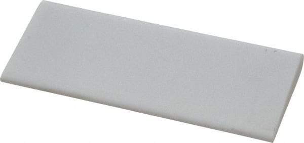 Norton - 4" Long x 1-3/4" Diam x 3/8" Thick, Novaculite Sharpening Stone - Round, Ultra Fine Grade - Makers Industrial Supply