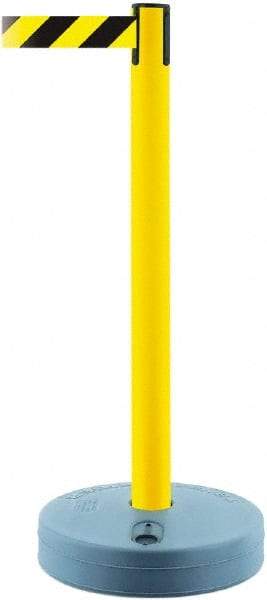 Tensator - 38" High, 2-1/2" Pole Diam, Barricade Tape Dispenser - 14" Base Diam, Round Plastic Base, Yellow Polymer Post, 7-1/2' x 1-7/8" Tape, Single Line Tape, For Outdoor Use - Makers Industrial Supply