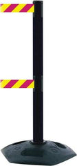 Tensator - 38" High, 2-1/2" Pole Diam, 4 Way Stanchion - 19" Base Diam, Octagon Recycled Rubber Base, Black Plastic Post, 7-1/2' x 2" Tape, Dual Line Tape, For Outdoor Use - Makers Industrial Supply