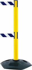 Tensator - 38" High, 2-1/2" Pole Diam, 4 Way Stanchion - 19" Base Diam, Octagon Recycled Rubber Base, Yellow Plastic Post, 7-1/2' x 2" Tape, Dual Line Tape, For Outdoor Use - Makers Industrial Supply