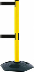 Tensator - 38" High, 2-1/2" Pole Diam, 4 Way Stanchion - 19" Base Diam, Octagon Recycled Rubber Base, Yellow Plastic Post, 13' x 2" Tape, Dual Line Tape, For Outdoor Use - Makers Industrial Supply