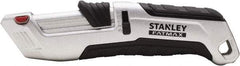 Stanley - Retractable Safety Utility Knife - 2.175" Steel Blade, Silver & Black Ergonomic Non-slip Grips Handle, 4 Blades Included - Makers Industrial Supply