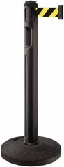 Lavi Industries - 38-1/4" High, 3-1/4" Pole Diam, Stanchion - 16" Base Diam, Dome Recycled Rubber Base, Black Plastic Post, 12' x 2" Tape, Single Line Tape, For Outdoor Use - Makers Industrial Supply