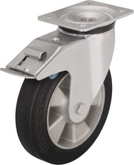 Blickle - 6-1/2" Diam x 1-31/32" Wide x 7-61/64" OAH Top Plate Mount Swivel Caster with Brake - Solid Rubber, 880 Lb Capacity, Ball Bearing, 5-1/2 x 4-3/8" Plate - Makers Industrial Supply