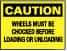 NMC - "Caution - Wheels Must Be Chocked Before Loading and Unloading", 10" Long x 14" Wide, Pressure-Sensitive Vinyl Safety Sign - Rectangle, 0.004" Thick, Use for Accident Prevention - Makers Industrial Supply